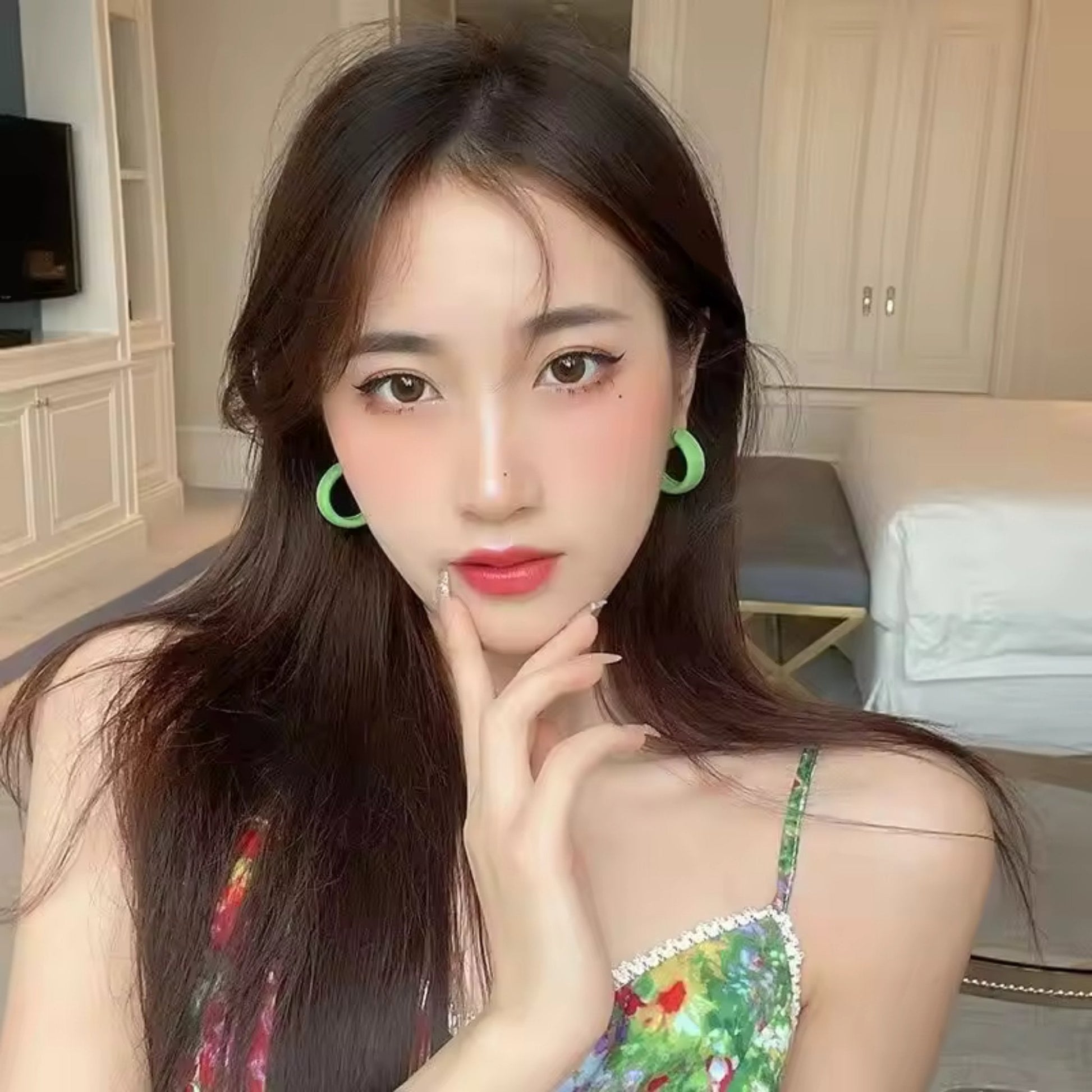 Candy Color Circle Acrylic Earrings in trendy Green, paired with a summer outfit for a vibrant and trendy touch.