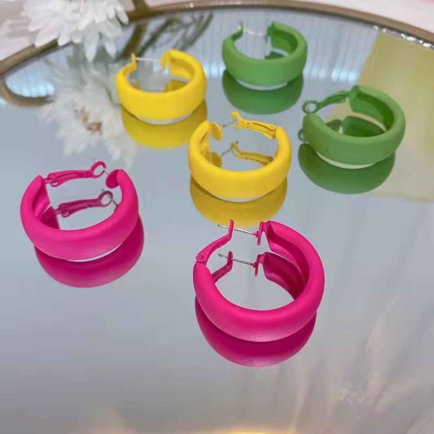 Collection of Candy Color Circle Acrylic Earrings in yellow, green, pink, and blue, perfect for mixing and matching with any outfit.