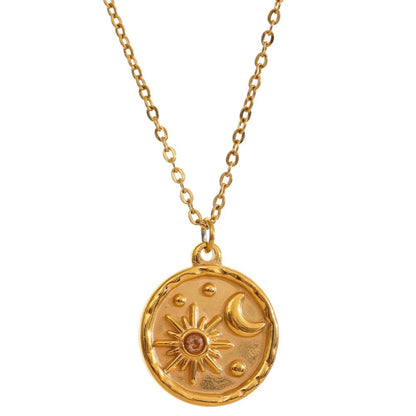 Celestial Sun and Moon Pendant Necklace with 18K gold-plated round pendant featuring detailed sun and moon motifs on a 40cm chain. Sun and Moon Pendant Necklace