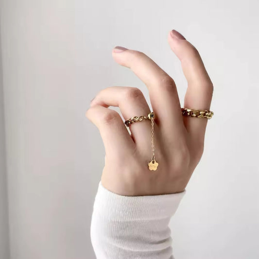 CharmLink Adjustable Duo Ring Set styled on fingers, featuring the pearl-accented and chain-link rings for a modern, elegant look.