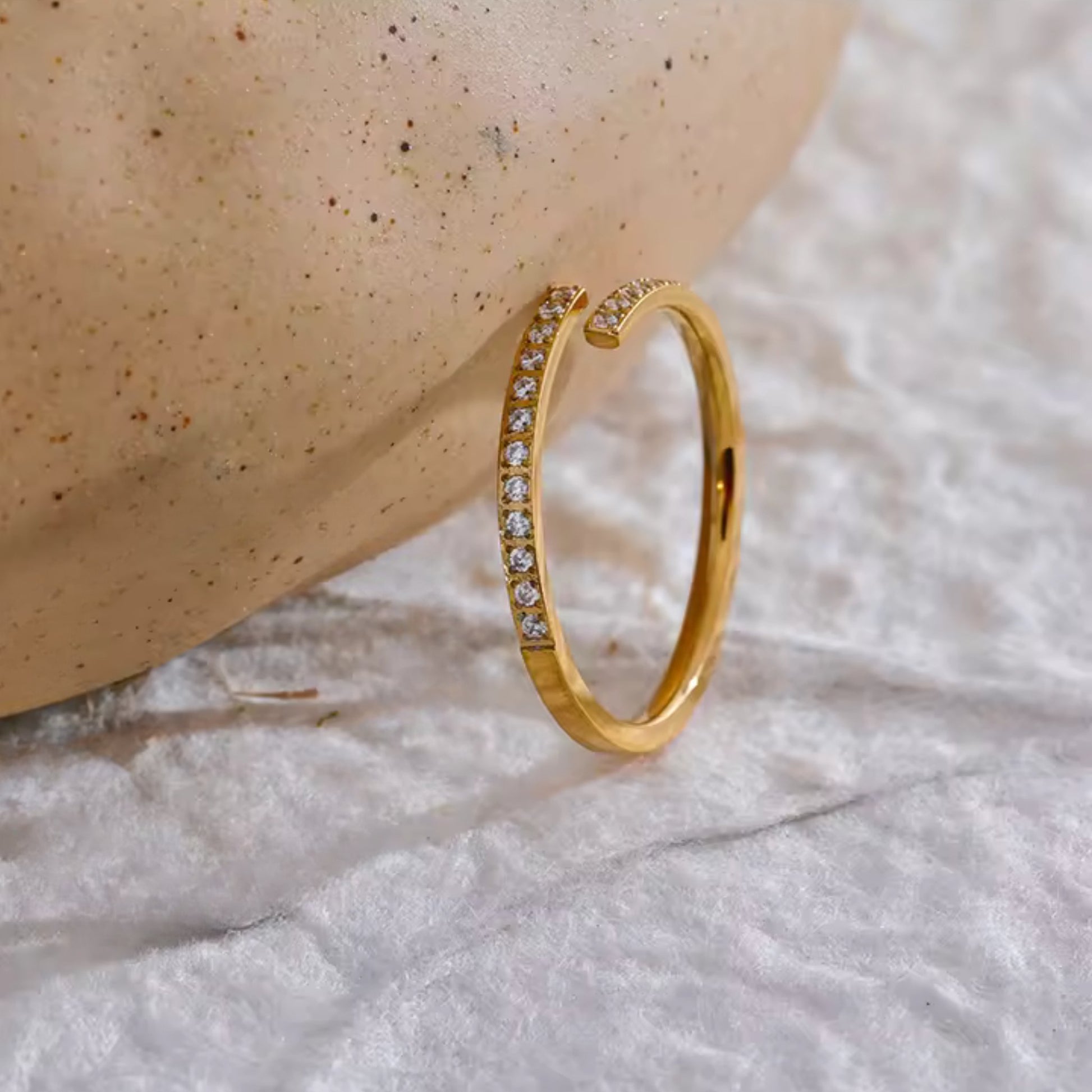Detail of the open-cuff design on the Classic Open-Cuff Crystal Ring, offering a modern and versatile twist.