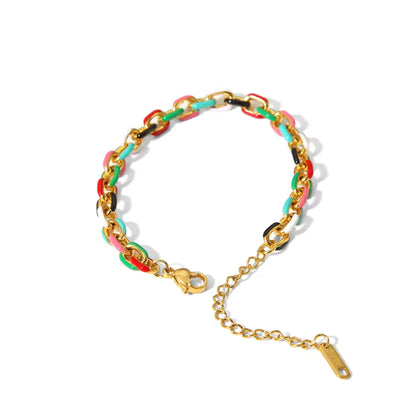 Color Splash Enamel Cuban Chain Bracelet, highlighting its playful and vibrant design.