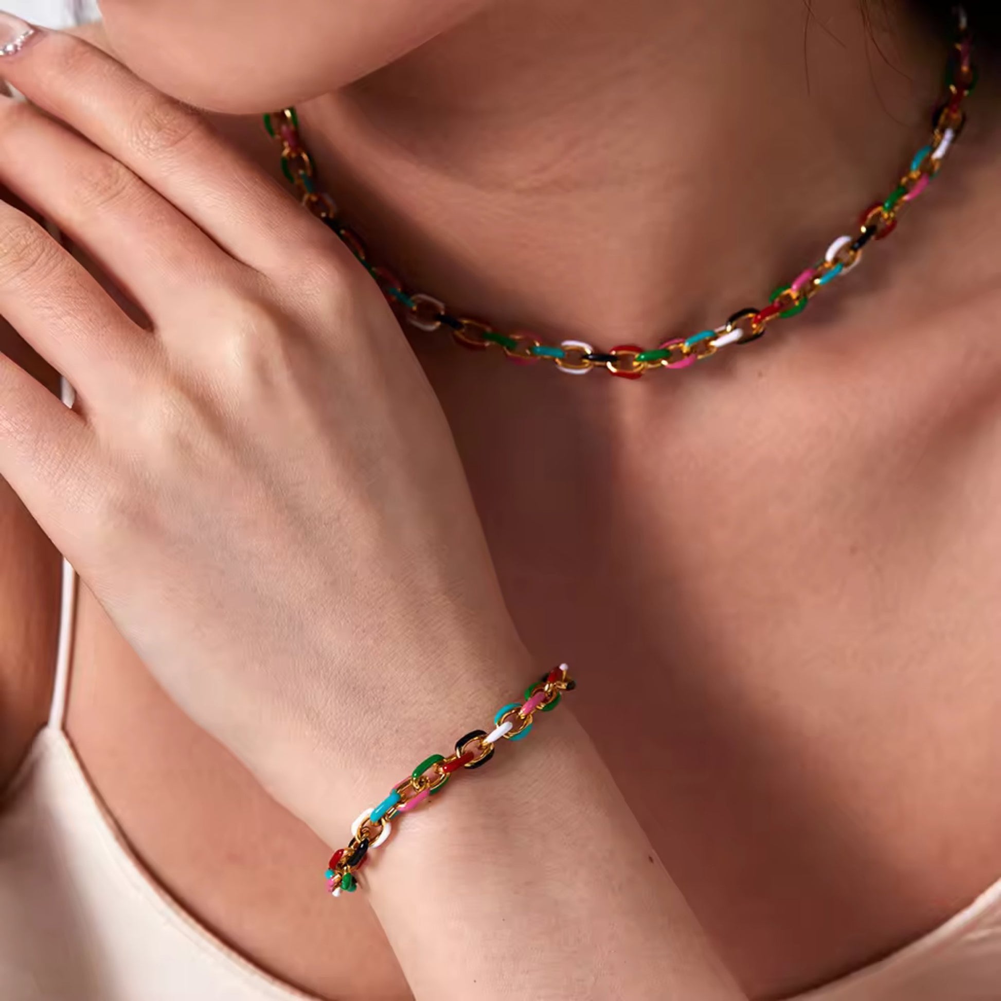 Color Splash Enamel Cuban Chain Necklace and Bracelet styled on a model, showcasing its bold multicolor design and luxurious gold finish.