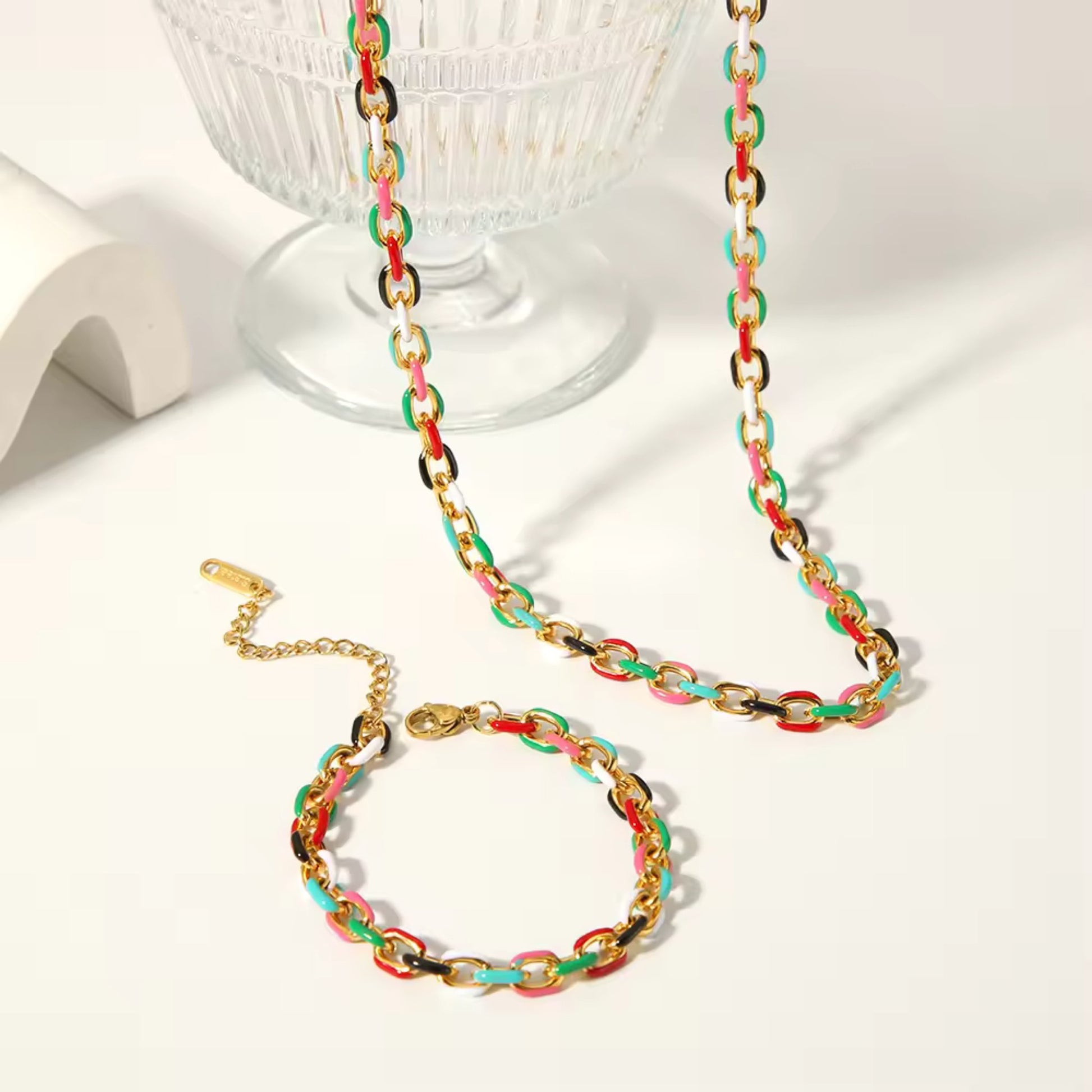 Close-up of the vibrant enamel drip design on the Cuban chain links of the Color Splash Enamel Chain Set.