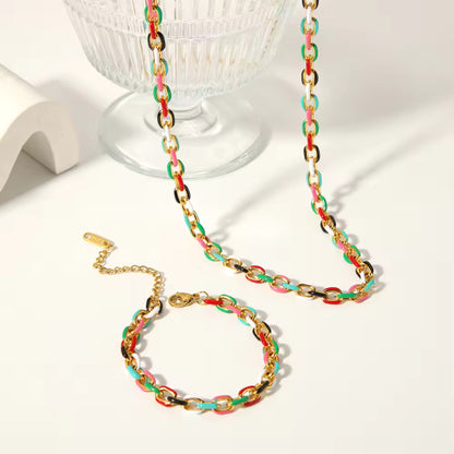 Close-up of the vibrant enamel drip design on the Cuban chain links of the Color Splash Enamel Chain Set.