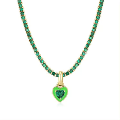 Close-up of the green zircon stones on the green Heart Zircon Tennis Necklace, enhancing its sparkle and vibrant appeal.