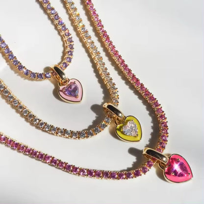 Close-up of the heart-shaped pendant on the Colorful Heart Zircon Tennis Necklace, highlighting its vibrant color and intricate detailing.