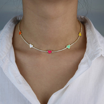 Colorful Hearts Choker Necklace styled on a model, highlighting its playful design and elegant fit.