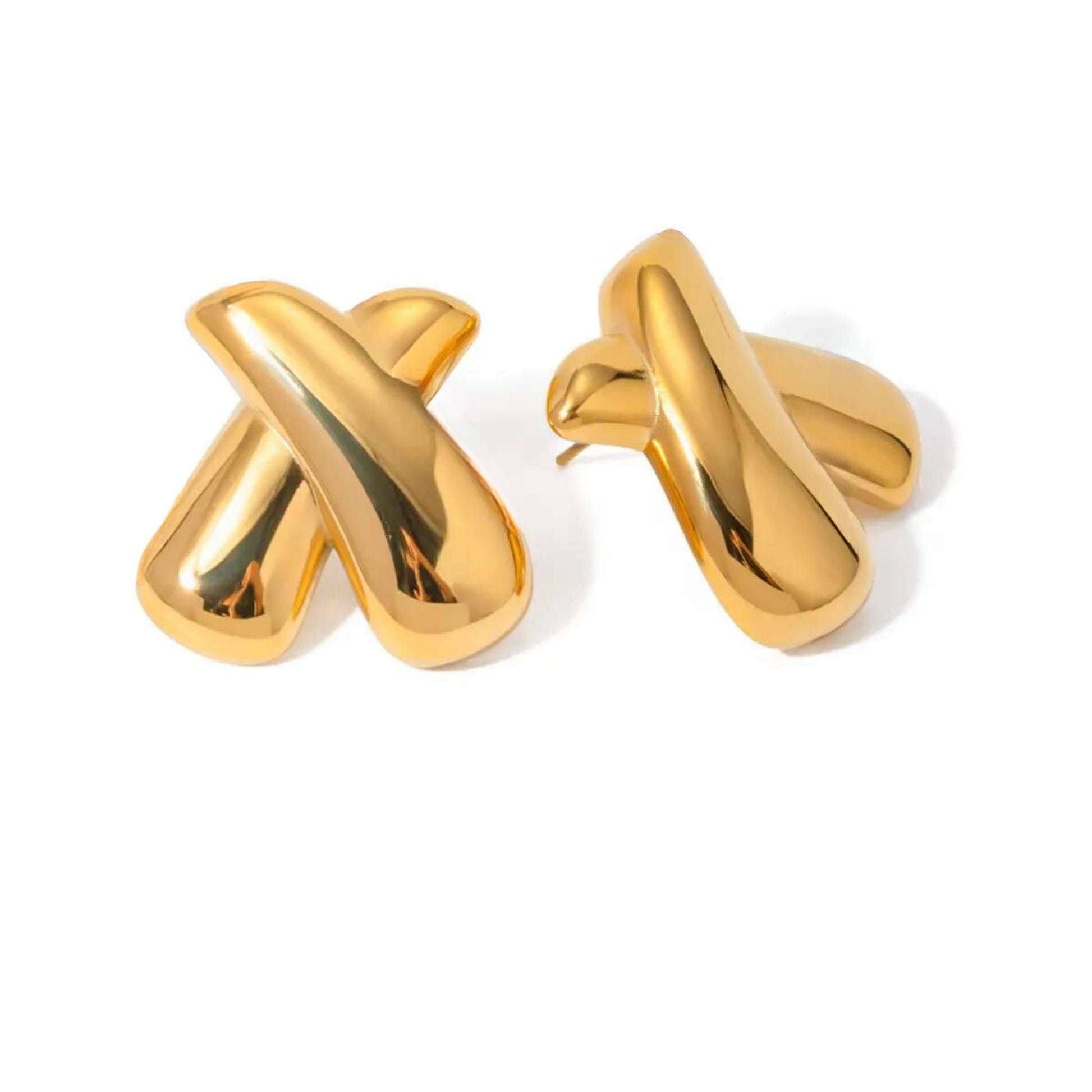 Close-up of the high-polished Crossed Elegance Earring in Gold, showcasing its fluid and modern design.
