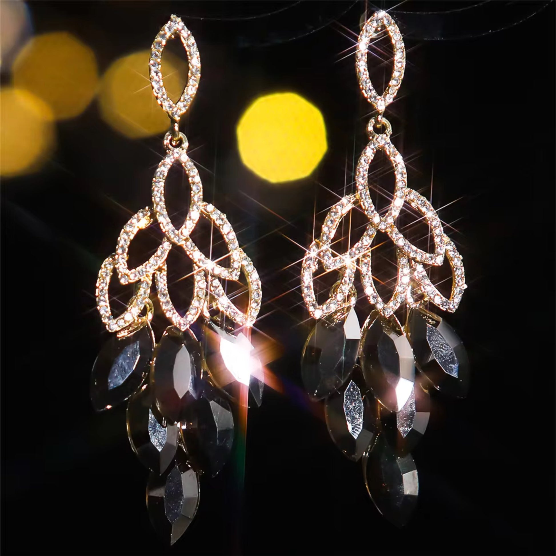 Close-up of the intricate interlocking cubic zirconia pattern of the Crystal Cascade Drop Earrings.