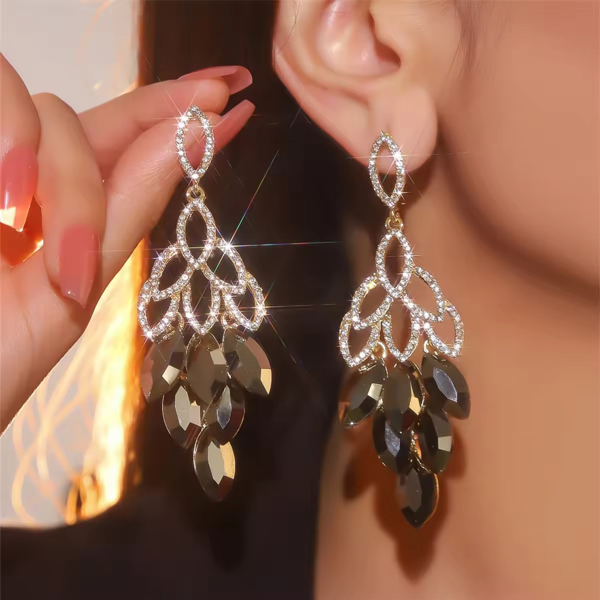 Model wearing the Crystal Cascade Drop Earrings, highlighting their elegant cascading design.