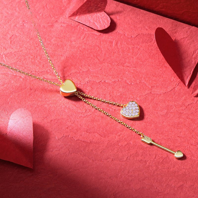 Close-up of the Cupid’s Embrace Necklace, showcasing the intricate heart and zircon detailing.
