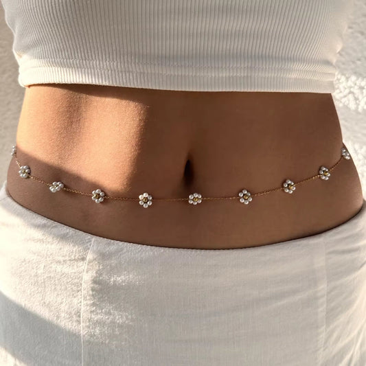 Model wearing the Daisy Dreams Belly Chain styled with a bikini, showcasing its summer-ready look.