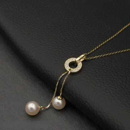 Close-up of the Dancing Pearls Necklace, highlighting its adjustable chain and elegant design.