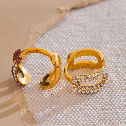 Gold-plated Dazzling Twist Multicolor Crystal Rings displayed in a jewelry box, perfect for gifting.