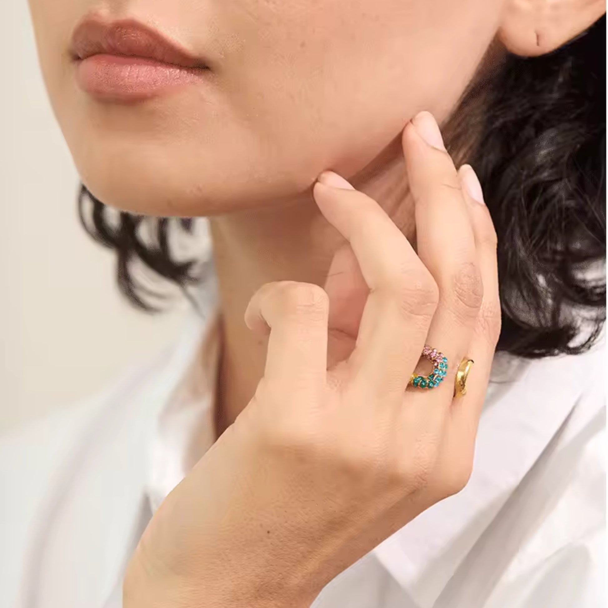 Model wearing the Dazzling Twist Multicolor Crystal Ring Set, adding sparkle and color to a casual outfit.