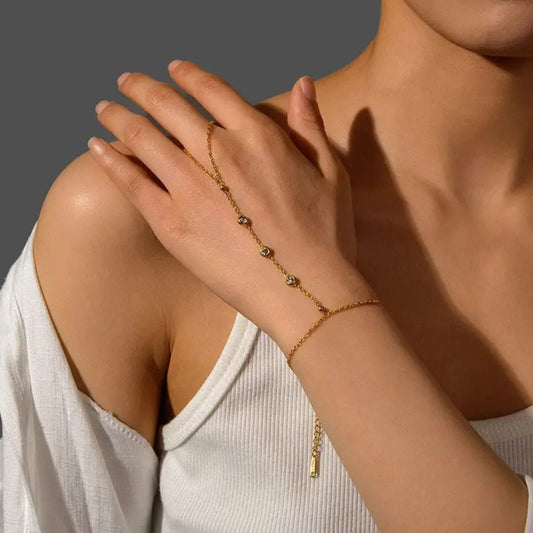 Model wearing the Delicate Crystal Hand Chain Bracelet, showcasing its graceful design.