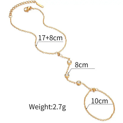 Delicate Crystal Hand Chain Bracelet displayed flat with detailed chain and crystal elements.