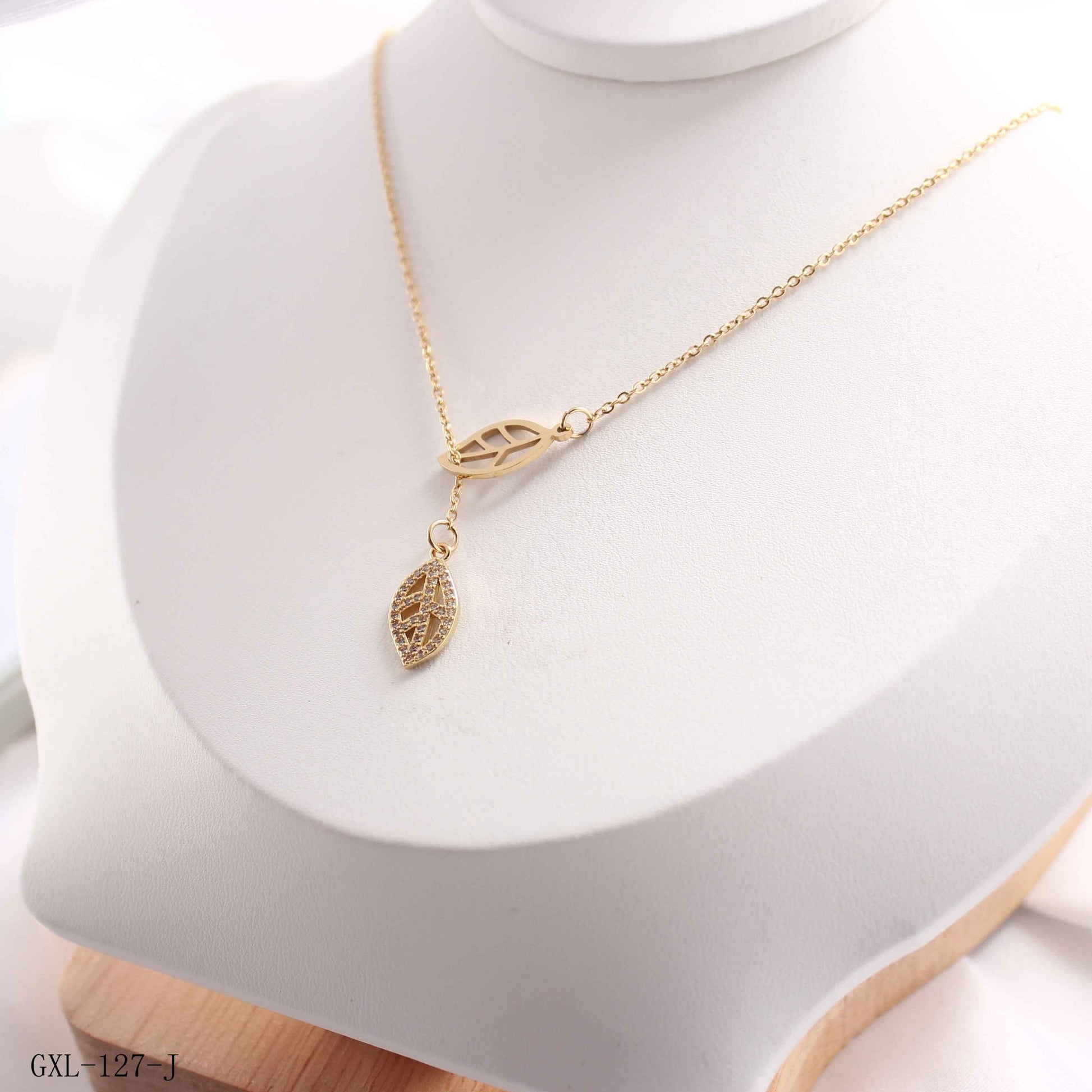 Model wearing the Delicate Leaf Pendant Necklace, showcasing its natural charm and adjustable fit.