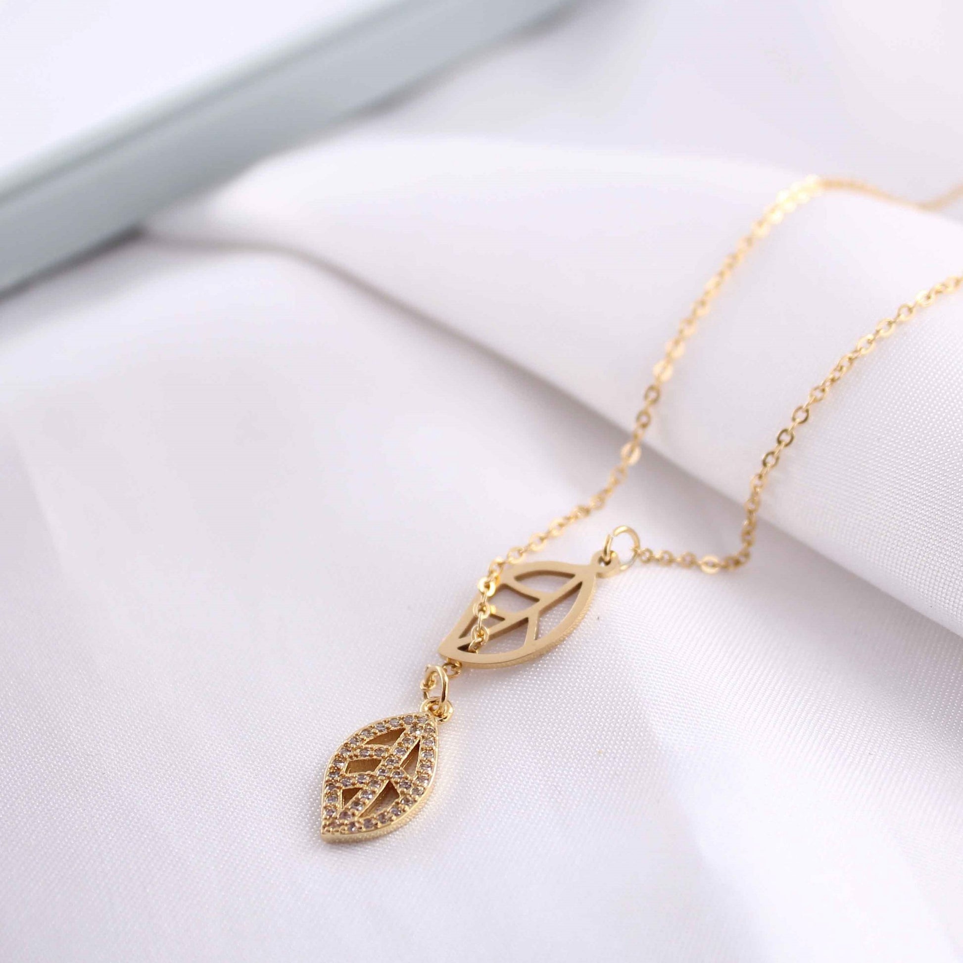 Close-up of the 18K gold-plated leaf pendant design on the Delicate Leaf Pendant Necklace.