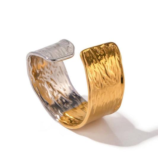 Dual Tone Textured Adjustable Ring featuring a wide band with half gold and half silver design and intricate pattern.