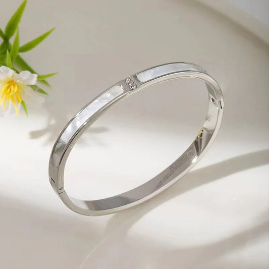 Elegance in Pearl Cuff Bracelet with silver plating and delicate mother-of-pearl inlay.