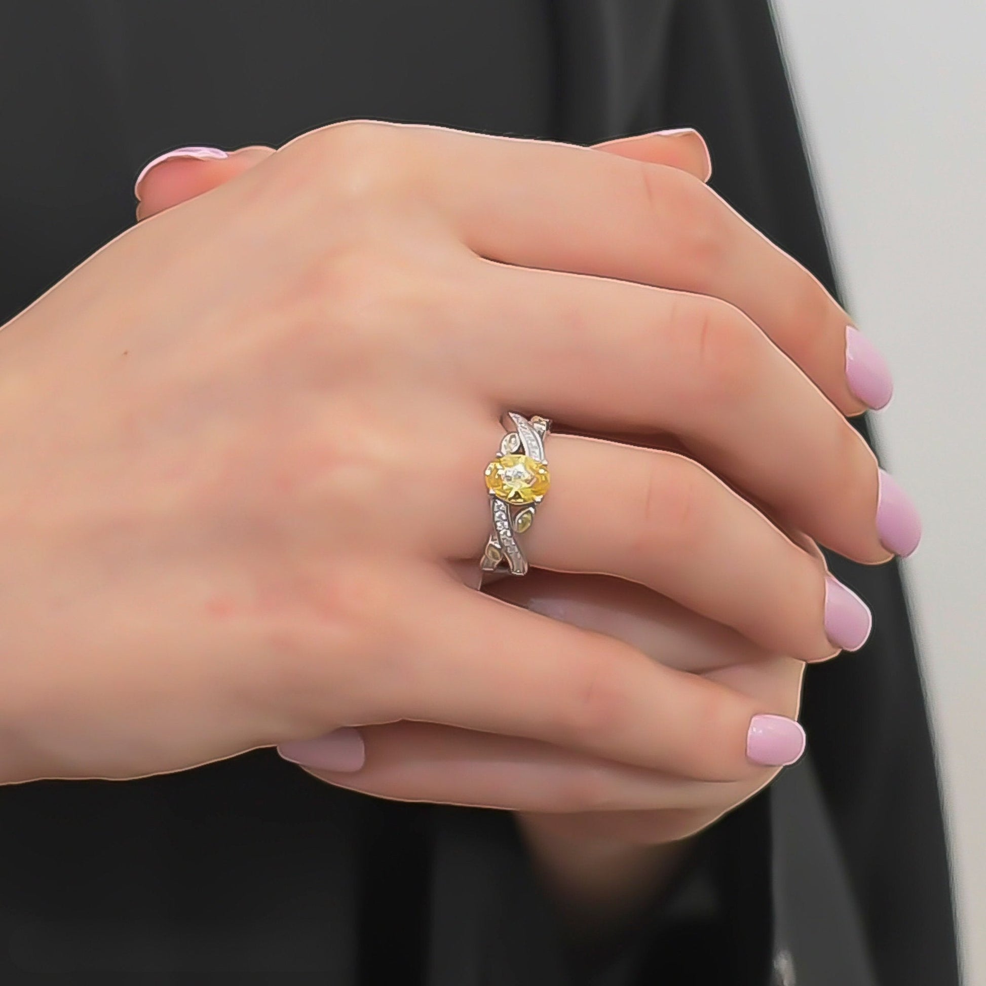 Model wearing a Yellow CZ Platinum-Plated Ring, perfect for an elegant occasion.