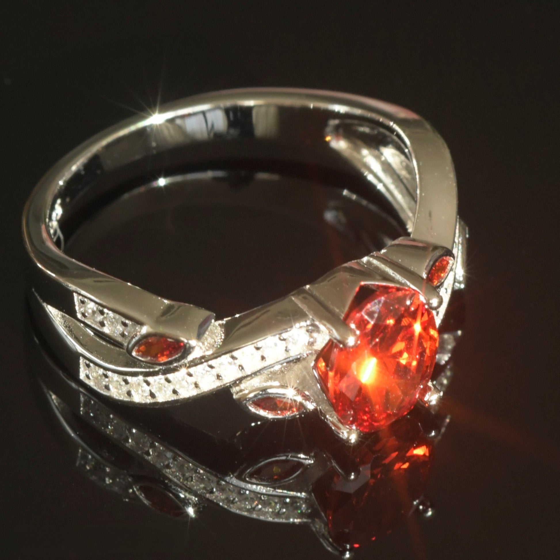 925 Sterling Silver Ring with a bold Red CZ centerpiece and detailed CZ accents.