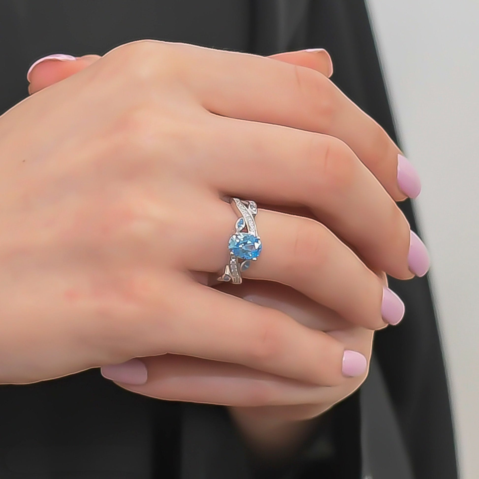 Model wearing a Baby Blue CZ Platinum-Plated Ring, perfect for an elegant occasion.