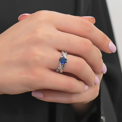 Model wearing a Dark Blue CZ Platinum-Plated Ring, perfect for an elegant occasion.