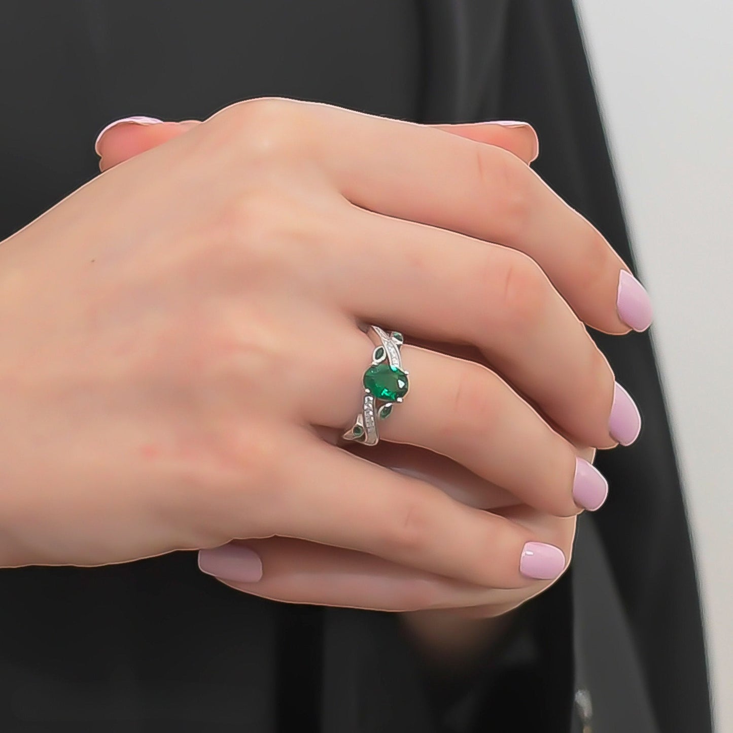 Model wearing a Green CZ Platinum-Plated Ring, perfect for an elegant occasion.