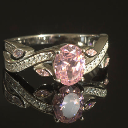 Elegant Pink Cubic Zirconia Platinum-Plated Ring displayed in a velvet jewelry box.