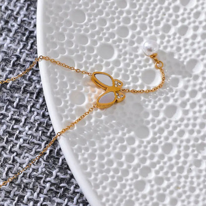 Side View of Butterfly Pendant with Zircon and Pearl Detail