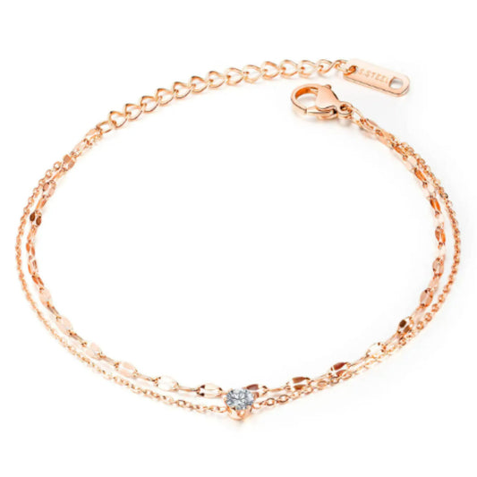 Close-up of the double-layer anklet design showcasing the sparkling zircon stone and rose gold finish.
