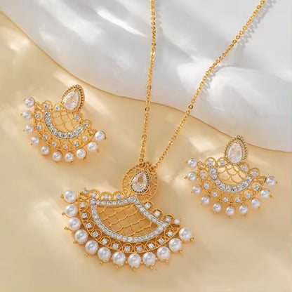 Fan-Shaped Pearl Necklace and Earring Set with 18K gold plating and lustrous pearls, displayed on a clean white background.