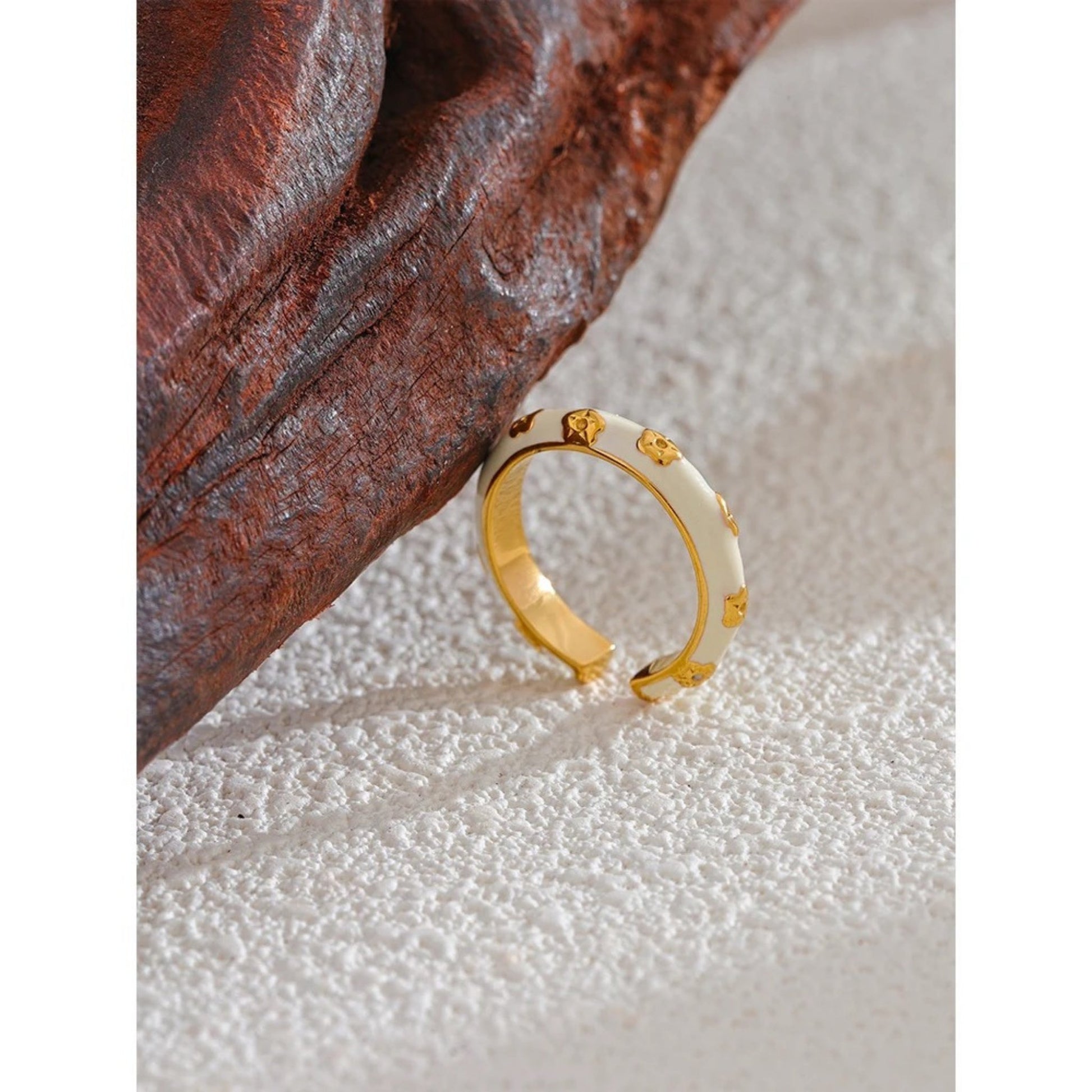 Adjustable open design of the White Enamel Ring ensuring a comfortable fit for all sizes.