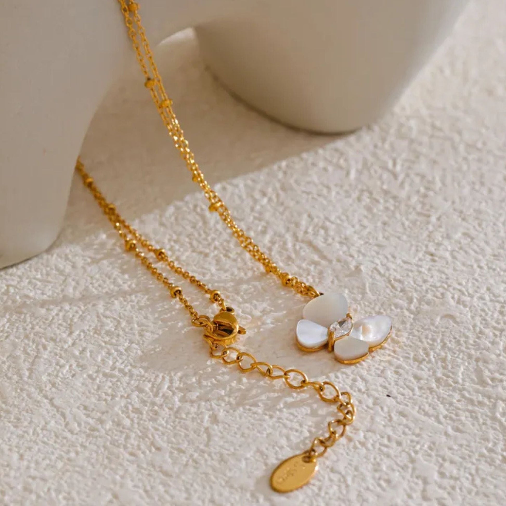 Close-Up of Gold-Plated Flower Pendant Necklace