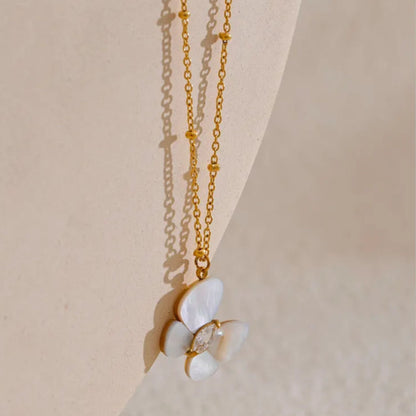 Close-Up of Gold-Plated Flower Pendant Necklace