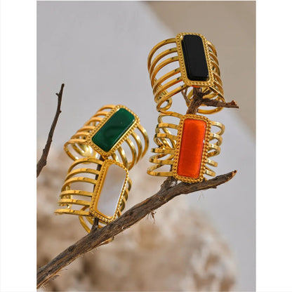 Adjustable Elegant Multicolor Stone Hollow Open Ring in black stone, demonstrating its customizable fit for any finger size.