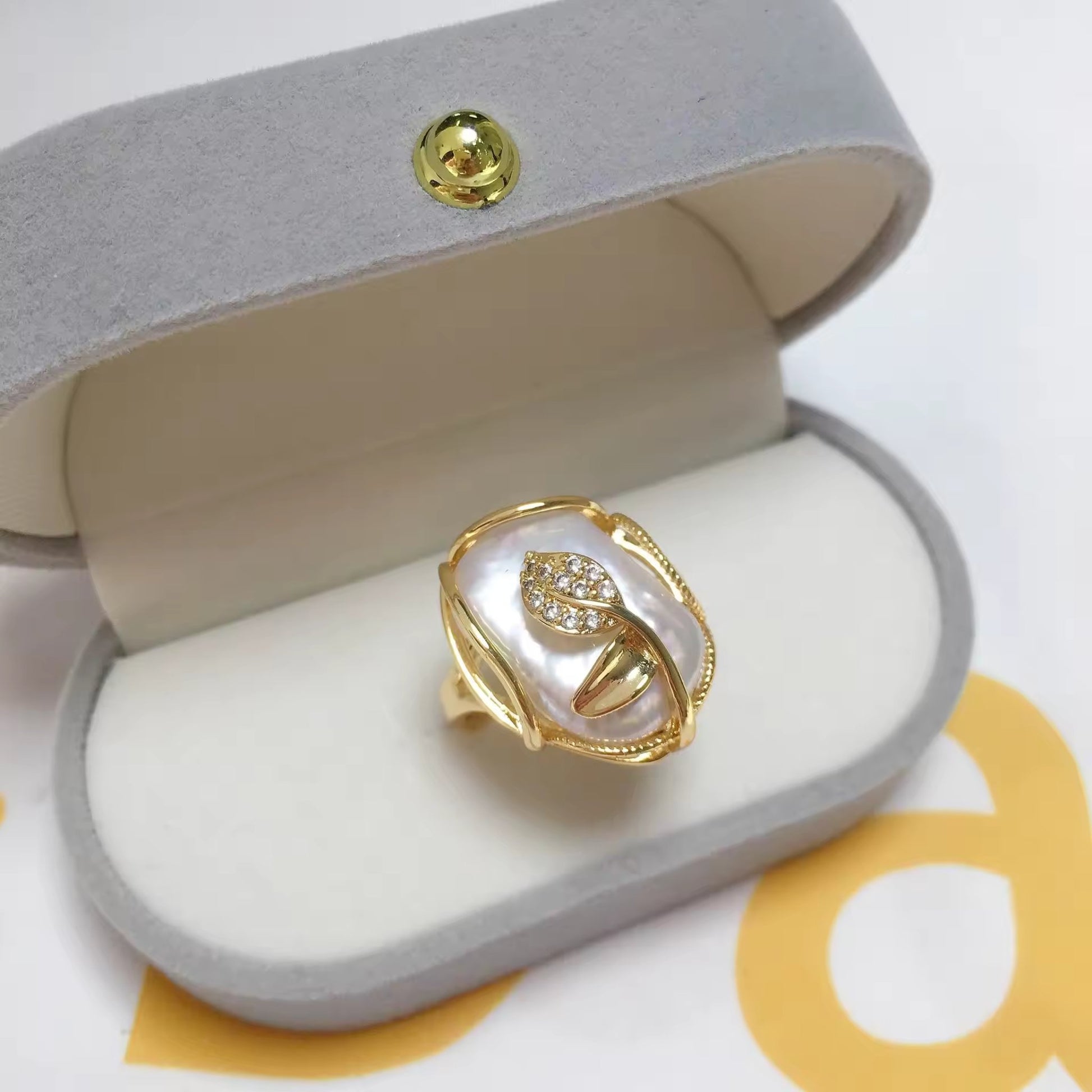 Elegant Pearl Blossom Adjustable Ring in gold with a lustrous white freshwater pearl, perfect for timeless style.