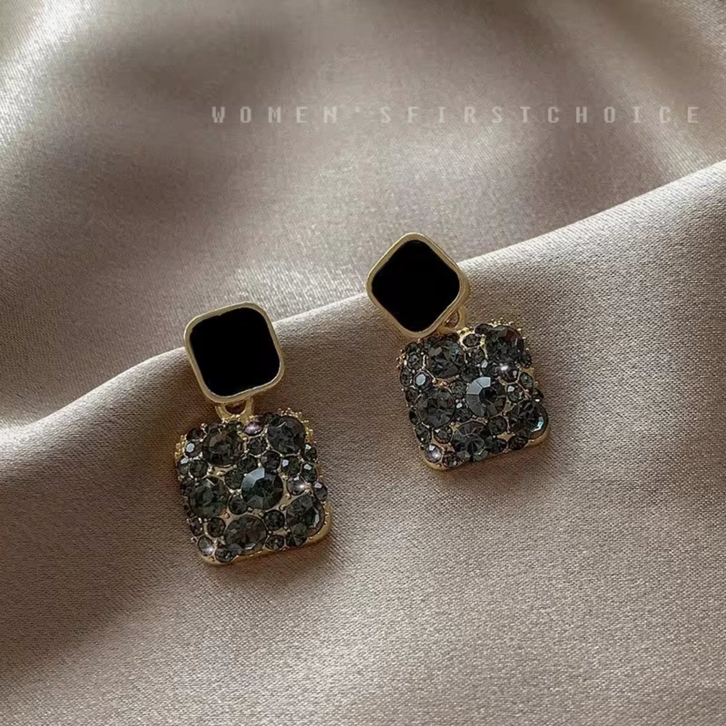 Black Gold-plated square crystal stud earrings with 925 Sterling Silver needles, featuring dazzling crystals.