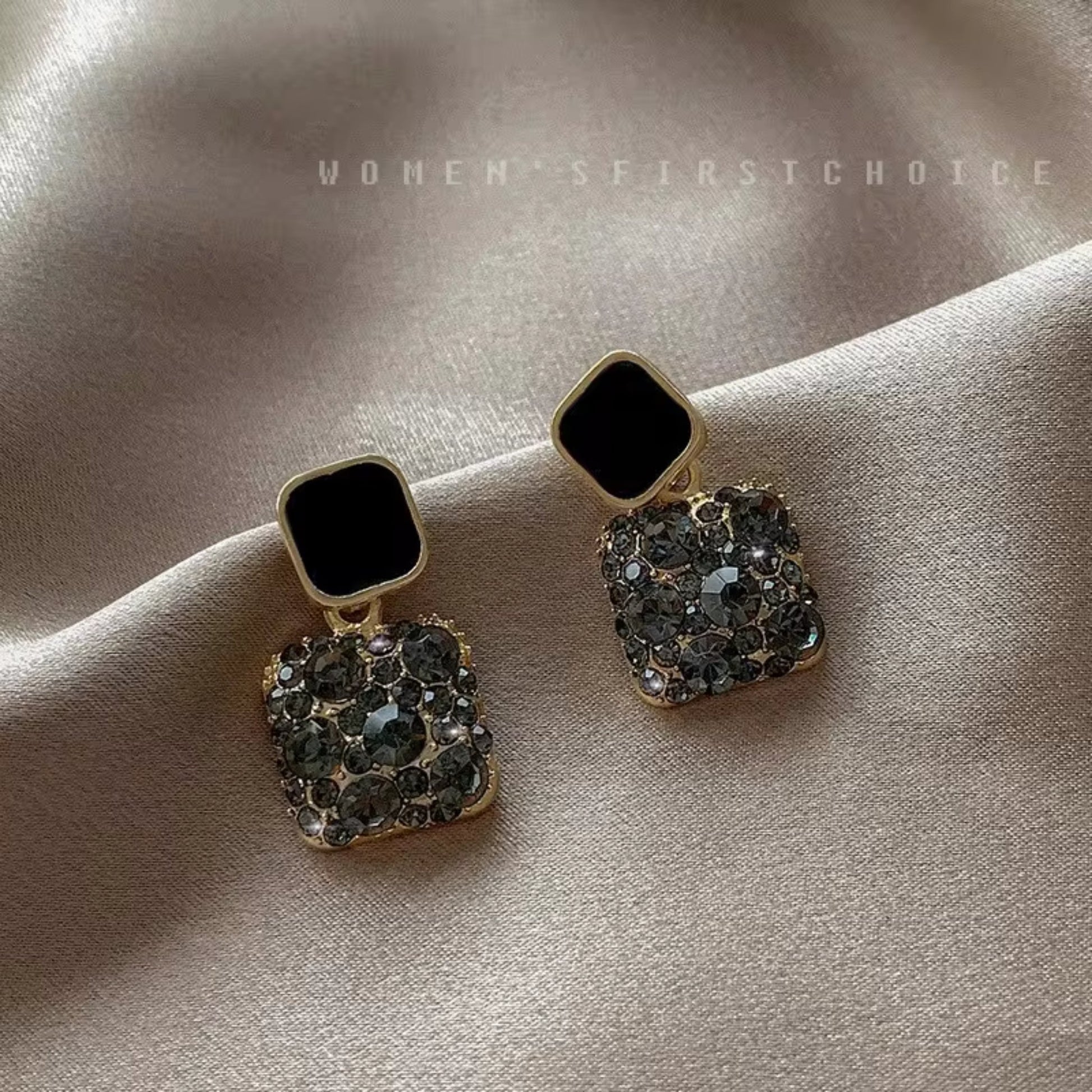 Black Gold-plated square crystal stud earrings with 925 Sterling Silver needles, featuring dazzling crystals.