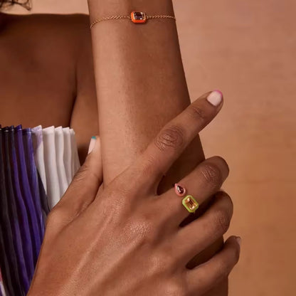 Enamel Duo Gemstone Ring showcased on a hand, highlighting its unique design and playful color contrasts.