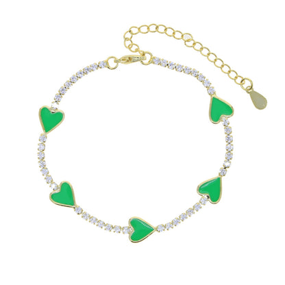 Enamel Heart Gold Plated Bracelet with green enamel hearts and sparkling CZ stones, adjustable with a 4 cm extender for a perfect fit.