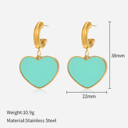 Detailed view of Enamel Heart Hoop Earrings, showcasing gold-tone hoops with vibrant Light Green enamel heart pendants.