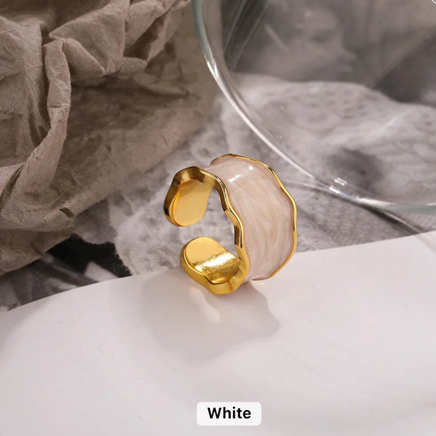 Enchanted Wave Adjustable Ring in 18K gold-plated 925 Sterling Silver with luxurious White enamel paint and a wave-shaped design.