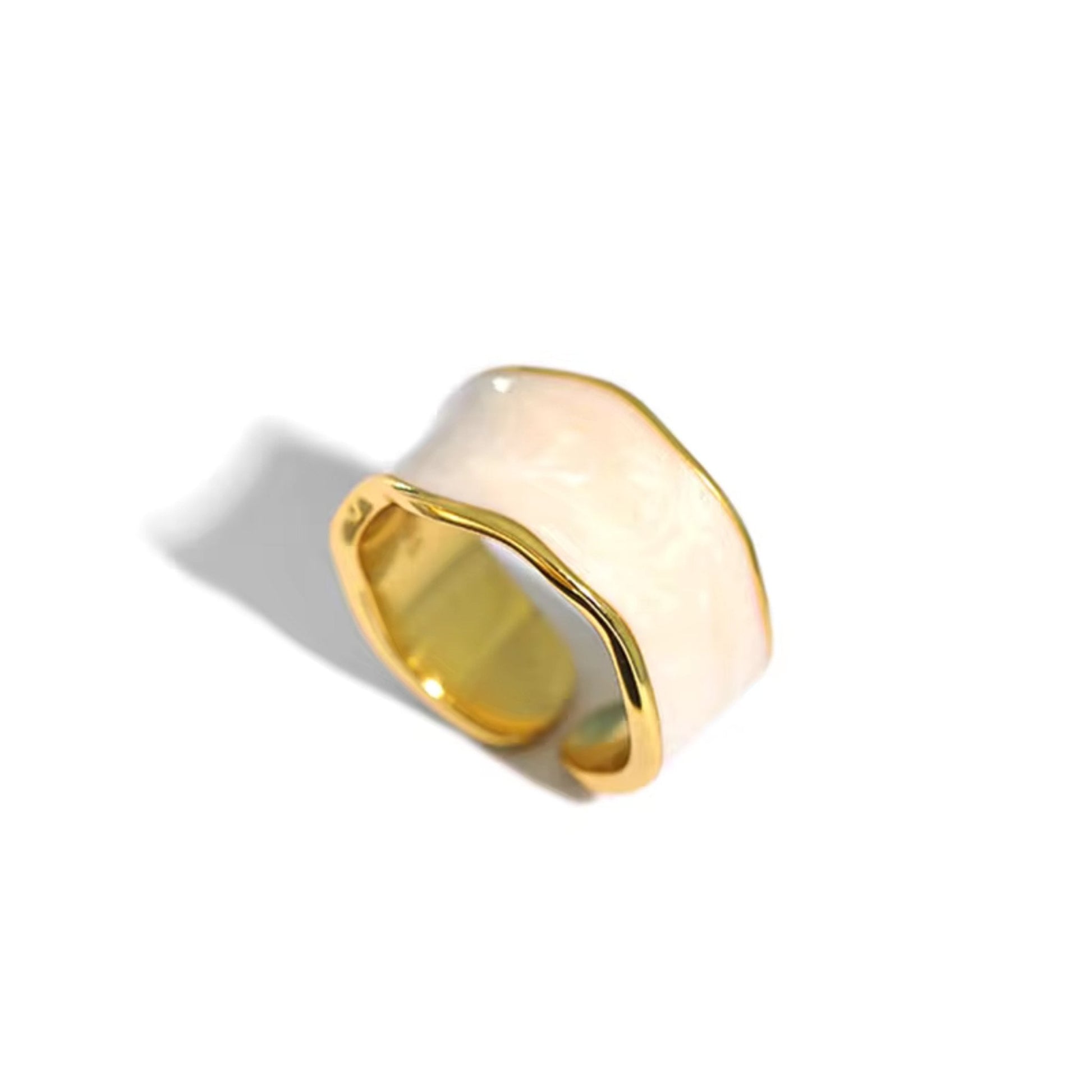 Enchanted Wave Adjustable Ring in 18K gold-plated 925 Sterling Silver with luxurious White enamel paint and a wave-shaped design.