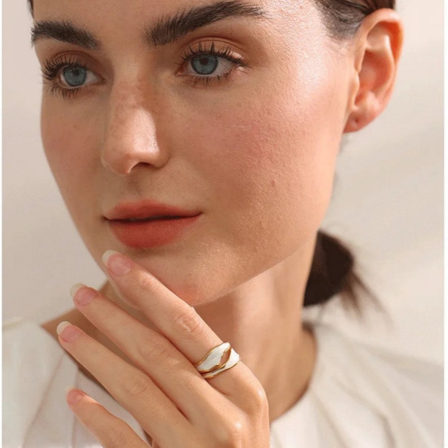 Model wearing the Enchanted Waves Open Ring, displaying the adjustable open fit and elegant wave-inspired design.