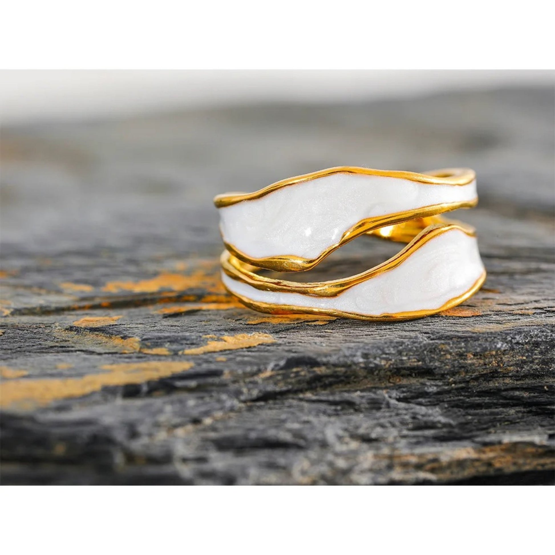 Enchanted Waves Open Ring styled with matching gold-plated accessories, highlighting its versatility and modern aesthetic.