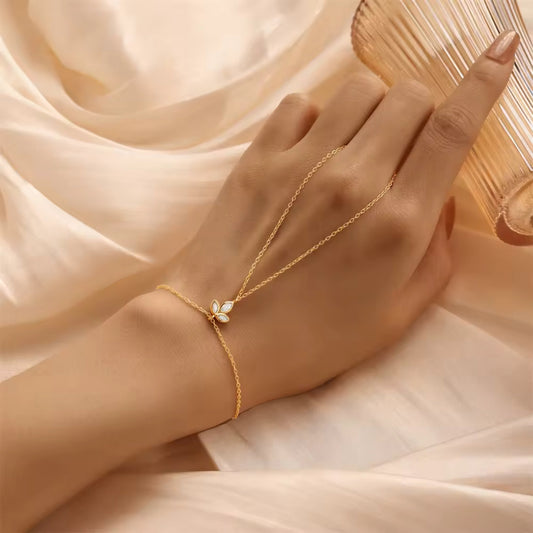 Model wearing the Ethereal Grace Chain Ring Horse Eye Bracelet, highlighting its elegant connection between the chain, ring, and horse eye design.